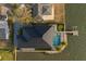 Beautiful waterfront property showcasing a stunning pool, manicured lawn, and private dock for ultimate outdoor enjoyment at 3310 Sunset N Dr, St Petersburg, FL 33710