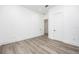 An open and bright bedroom with hardwood floors at 3310 Sunset N Dr, St Petersburg, FL 33710