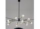 Unique modern chandelier with multiple lights and geometric design at 3310 Sunset N Dr, St Petersburg, FL 33710
