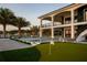 Backyard features a private pool, putting green, and immaculate two-story home overlooking the water at 3310 Sunset N Dr, St Petersburg, FL 33710