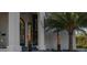 Charming walkway leading up to an elegant front door and lush tropical landscaping at 3310 Sunset N Dr, St Petersburg, FL 33710