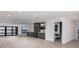 Spacious living room with wet bar, offering picturesque waterfront views at 3310 Sunset N Dr, St Petersburg, FL 33710