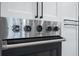 Stainless steel oven with detailed knobs and a built-in timer display at 3310 Sunset N Dr, St Petersburg, FL 33710