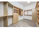 Spacious walk-in closet featuring custom shelves, drawers, and ample storage space at 3310 Sunset N Dr, St Petersburg, FL 33710