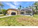 The home features a screened in pool and spacious backyard at 5404 Carso Ter, North Port, FL 34286