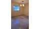 Bedroom with overhead lighting and terrazzo flooring at 8641 May Cir, Tampa, FL 33614