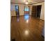 Open floor plan featuring hardwood flooring and ample space at 8641 May Cir, Tampa, FL 33614