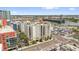Stunning aerial view of a multistory condo community, surrounded by city amenities and Tampa Bay at 1238 E Kennedy Blvd # 802, Tampa, FL 33602
