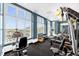 Bright gym equipped with cardio machines and weights featuring natural light and ample space at 1238 E Kennedy Blvd # 802, Tampa, FL 33602