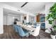 Open floor plan featuring a dining room and living room, hardwood floors and plenty of natural light at 1238 E Kennedy Blvd # 802, Tampa, FL 33602