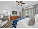 Bright main bedroom with wood floors and stylish decor, offering a comfortable retreat at 1238 E Kennedy Blvd # 802, Tampa, FL 33602