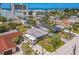 Aerial view of single-Gathering home with an RV in the driveway, and well-maintained landscaping at 15406 2Nd E St, Madeira Beach, FL 33708