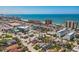 Expansive aerial shot capturing the scenic coastline, highlighting the neighborhood's close proximity to the beautiful beach at 15406 2Nd E St, Madeira Beach, FL 33708