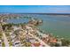 Picturesque waterfront neighborhood with charming homes, lush landscaping, and easy access to the bay at 15406 2Nd E St, Madeira Beach, FL 33708