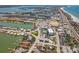 Waterfront homes with private docks, complemented by a lively mix of commercial properties near the beach at 15406 2Nd E St, Madeira Beach, FL 33708