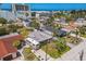 Aerial view of single-Gathering home with an RV in the driveway, and mature trees at 15406 2Nd E St, Madeira Beach, FL 33708