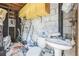 Basement features unfinished walls, toilet, and sink at 15406 2Nd E St, Madeira Beach, FL 33708