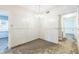 Corner view of empty dining room featuring tile flooring at 15406 2Nd E St, Madeira Beach, FL 33708
