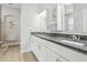 Large bathroom features dual sinks, granite countertops, and ample cabinet space at 29704 Eagle Station Dr, Wesley Chapel, FL 33543