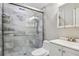 Modern bathroom featuring a tiled shower, a sleek vanity, and contemporary fixtures at 29704 Eagle Station Dr, Wesley Chapel, FL 33543