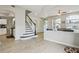Open floor plan, features sleek hardwood flooring and natural light at 29704 Eagle Station Dr, Wesley Chapel, FL 33543