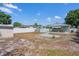 Spacious backyard with shed, patio, and partial fencing at 4100 46Th N Ave, St Petersburg, FL 33714