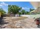 Large backyard with partial fencing, storage shed, and trees at 4100 46Th N Ave, St Petersburg, FL 33714