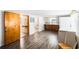 Open concept living space with wood-look floors, and a kitchen view at 4100 46Th N Ave, St Petersburg, FL 33714