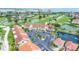 Stunning aerial view of the property overlooking the golf course, ponds and ocean at 6131 Bahia Del Mar Blvd # 139, St Petersburg, FL 33715