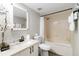 Updated bathroom features a white vanity, modern fixtures, and a shower with a bathtub and curtain at 6131 Bahia Del Mar Blvd # 139, St Petersburg, FL 33715