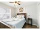 Bedroom with a queen sized bed and a decorative swan made of towels at 6131 Bahia Del Mar Blvd # 139, St Petersburg, FL 33715