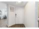 Clean and bright entryway featuring a white door and modern finishes, leading into a welcoming space at 6131 Bahia Del Mar Blvd # 139, St Petersburg, FL 33715