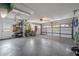Spacious two car garage with overhead lighting and plenty of room for storage at 8202 Shadow Pine Way, Sarasota, FL 34238