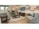 Inviting living room with neutral color palette, comfortable seating, stylish decor, and plush rug at 6179 Notre Dame Ter, North Port, FL 34291