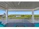 Deck with outdoor seating and expansive water views at 24145 Blackbeard Blvd, Punta Gorda, FL 33955