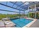 Inviting pool area with comfortable lounge chairs, spa, and a serene outdoor setting at 24145 Blackbeard Blvd, Punta Gorda, FL 33955
