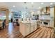 Bright kitchen features a large island, stainless steel appliances, and an open concept design at 3008 Sutton Woods Dr, Plant City, FL 33566