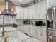 Well-equipped kitchen features granite countertops, stainless steel appliances, and ample cabinet space at 3008 Sutton Woods Dr, Plant City, FL 33566