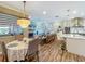 Spacious living space with a modern kitchen, dining area, and comfortable living room at 3008 Sutton Woods Dr, Plant City, FL 33566