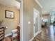Convenient half bath with a decorative mirror and stylish vanity at 3008 Sutton Woods Dr, Plant City, FL 33566