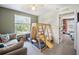 Cozy bedroom with a playset, neutral paint, carpeted floor, and natural light at 5703 New Paris Way, Ellenton, FL 34222