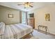 Cozy bedroom featuring a comfortable bed, modern decor, and a relaxing atmosphere at 5703 New Paris Way, Ellenton, FL 34222