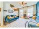 Inviting living room featuring comfortable seating, natural light, and a cozy atmosphere at 5703 New Paris Way, Ellenton, FL 34222