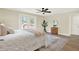 Cozy primary bedroom featuring modern decor, french doors to deck, and a serene ambiance at 6220 Pershing Ne St, St Petersburg, FL 33702