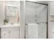 Clean bathroom featuring a glass-enclosed shower, vanity, and modern fixtures at 6801 16Th N St, St Petersburg, FL 33702