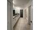 Bathroom showcasing double vanity, granite countertops, and walk-in shower at 13344 Great Plains S Dr, Riverview, FL 33579