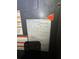 Close-up of the HVAC unit label showing important model and serial number information for servicing at 8731 N 26Th St, Tampa, FL 33604