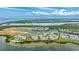 Aerial view of a beautiful waterfront community with stunning water and nature preserve views at 283 Saint Lucia Dr # 202, Bradenton, FL 34209