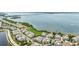 Aerial view showcasing the beautiful community, waterfront location, and well-maintained landscaping at 283 Saint Lucia Dr # 202, Bradenton, FL 34209