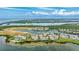 Aerial view of a beautiful waterfront community with stunning water and nature preserve views at 283 Saint Lucia Dr # 202, Bradenton, FL 34209